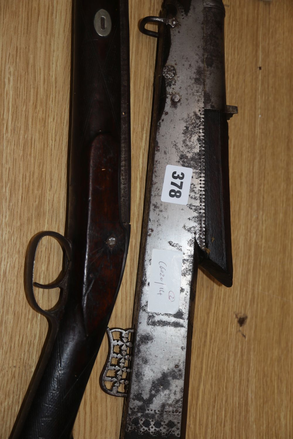 A 19th century percussion cap musket and an Eastern musket